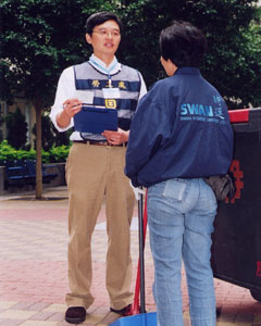 A labour inspector enquiring about the employment conditions of an employee of a public housing estate cleansing contractor